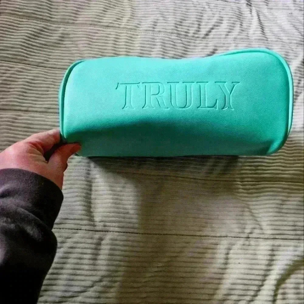 TRULY Los Angeles Cosmetcs bag. Mint green in color.